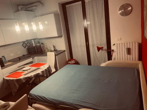 a kitchen with a table and a counter top at Luna in Cavalcaselle