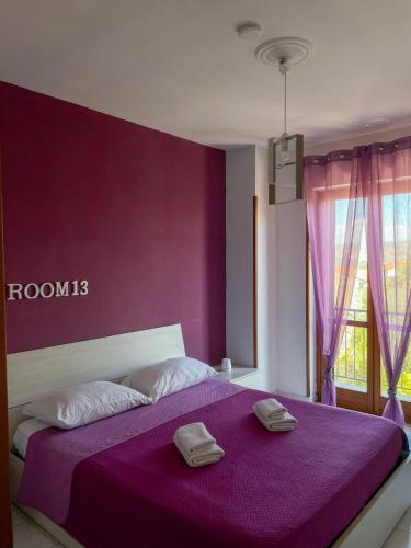 Giường trong phòng chung tại La Piazzetta