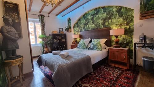 En eller flere senge i et værelse på Clos Germanois