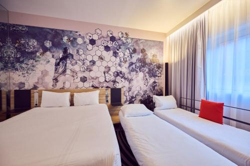 En eller flere senge i et værelse på a&o Manchester City Centre