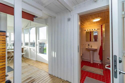 a bathroom with a toilet and a sink at BLE885-Ramdala-Ormen-langes-vaeg-10 in Ramdala
