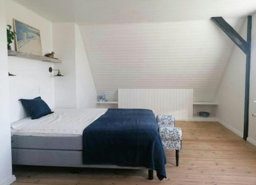 En eller flere senge i et værelse på Nature Gem Near Haderslev With 160-Year-Old Beech