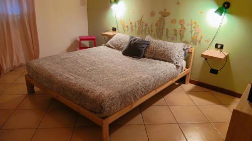 En eller flere senge i et værelse på LaelleApartament Rho Fiera San Siro