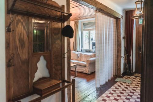 a hallway of a house with a living room at Le Pré en Bulles in Chiny
