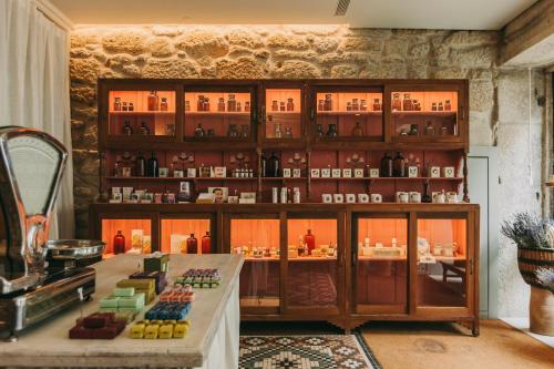 a store with a display case with medicines in it at Torel Saboaria in Porto