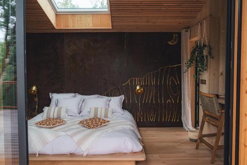 En eller flere senge i et værelse på Idylle du Causse