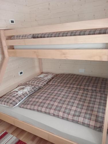 two bunk beds in a room at CASA CAMPAGNA in Cavalese