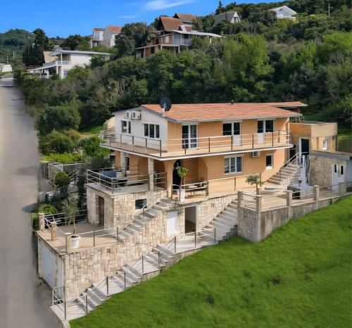 an aerial view of a house on a hill at Villa Sea La Vie in Utjeha