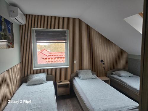 Letto o letti in una camera di Hostel Kandulski