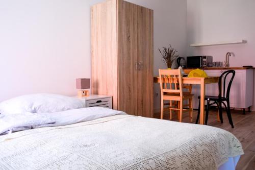 Postel nebo postele na pokoji v ubytování Przystawy Agroturystyka