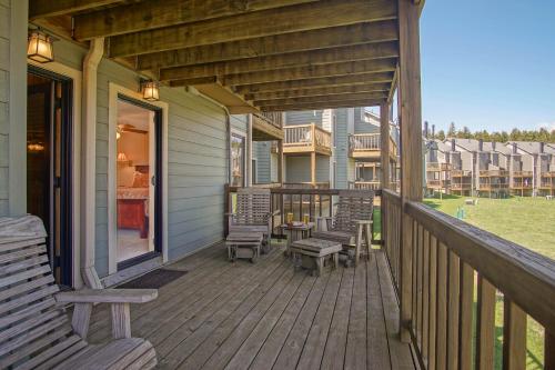 a porch with chairs and a table on a house at Powderidge 2 -Slope Side, Spacious Deck in Snowshoe