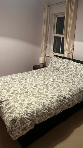 Postel nebo postele na pokoji v ubytování Kilohill House