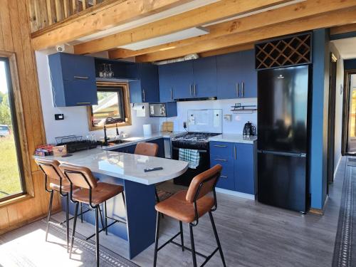 Køkken eller tekøkken på Cabaña y Tinaja Playa Chaiguao