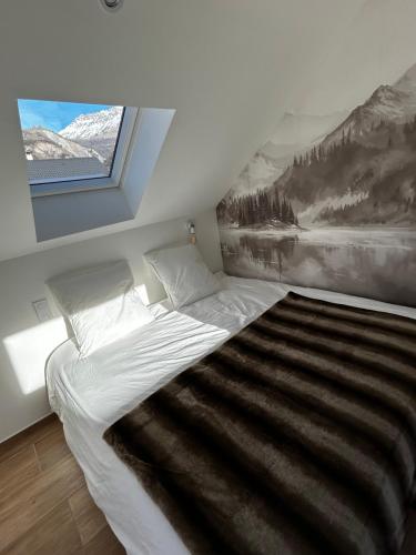 En eller flere senge i et værelse på L'Augustine - Le Cuchet