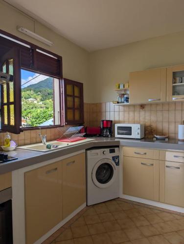 Cuina o zona de cuina de Location Hibiscus