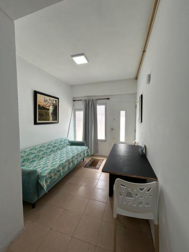 En eller flere senge i et værelse på El Nido FM