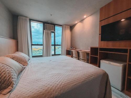 En eller flere senge i et værelse på Flat Comfort Taguatinga - Cama King - Sauna, academia e Piscina - Propriedade Particular 508