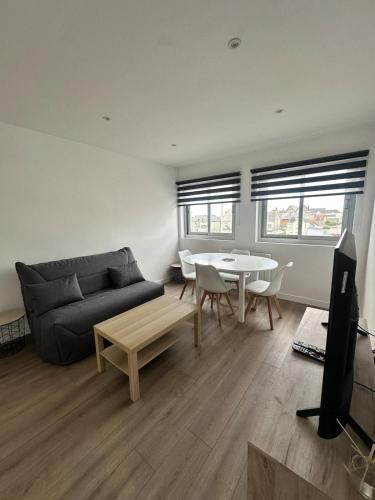 Zona d'estar a Beachfront Apartment