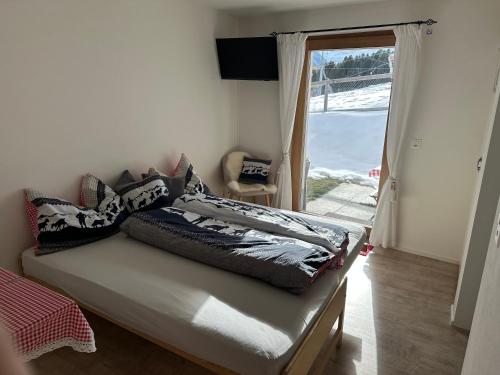 En eller flere senge i et værelse på Kleines aber feines Studio