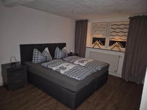 Postel nebo postele na pokoji v ubytování Ferienwohnung Panoramablick