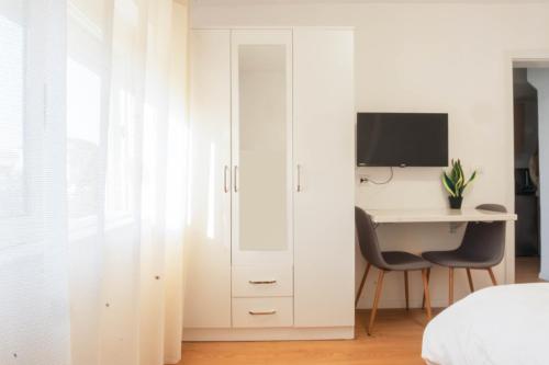 TV a/nebo společenská místnost v ubytování BS Apartment