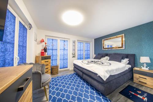 Giường trong phòng chung tại Alte Fischfabrik Am Leuchtturm