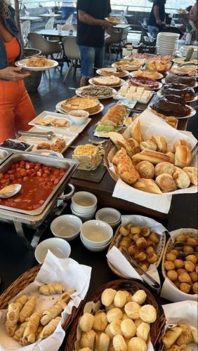 a long table filled with different types of food at Baku Khatai Hotel & Restaurant in Baku