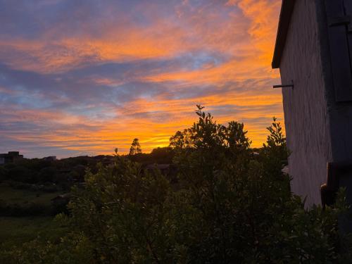 Blick auf den Sonnenuntergang/Sonnenaufgang von des Ferienhauses aus oder aus der Nähe