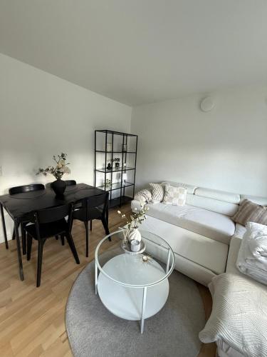 מיטה או מיטות בחדר ב-Modern Nyborg Suites