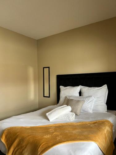 Giường trong phòng chung tại Villa Ndahafa