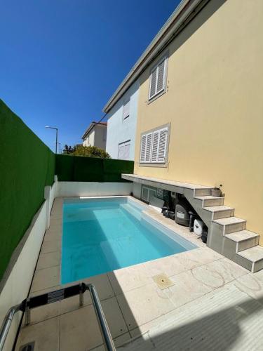 Casa cidade e piscina