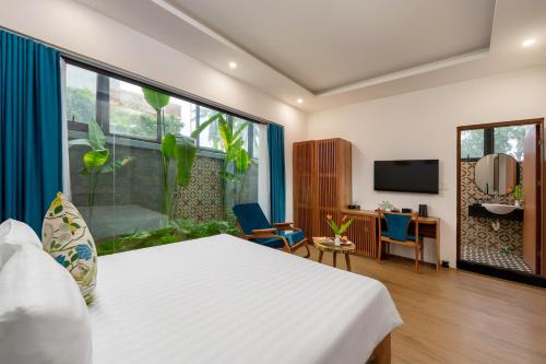 Gia Huy Riverside Hotel Hoi An — Garden view