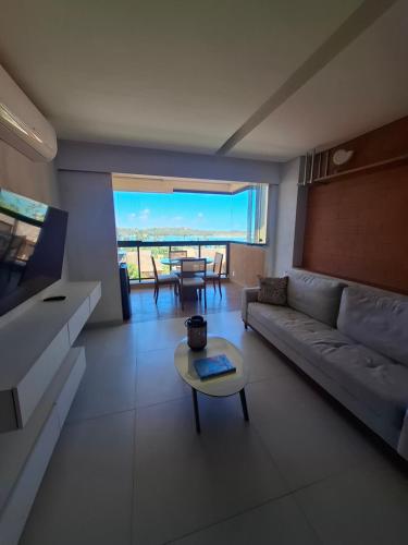 Khu vực ghế ngồi tại Eco Resort Carneiros Flat Colina