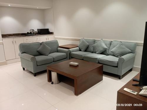 Khu vực ghế ngồi tại لؤلؤة راحتي للشقق الفندقية