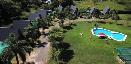 an aerial view of a resort with a swimming pool at Cabañas LAS PALMERAS in La Paz