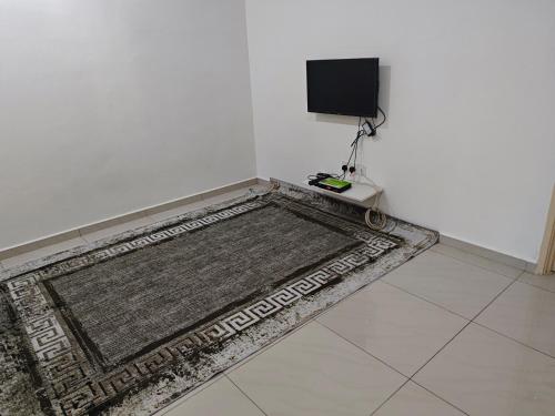 TV/trung tâm giải trí tại Homestay Atok Komando Bc Poly KB