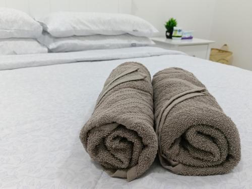 Postel nebo postele na pokoji v ubytování Nara Nook Homestay Bangi