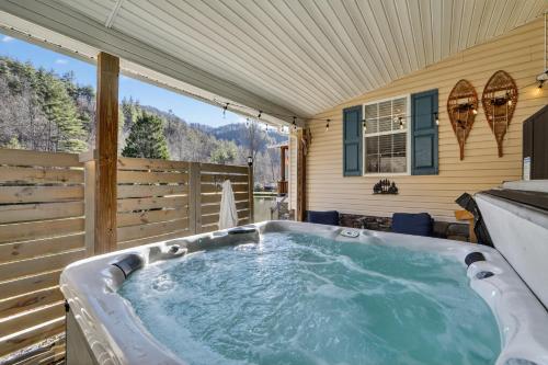 a hot tub in the backyard of a house at Twin Ponds Retreats retreat in Whittier