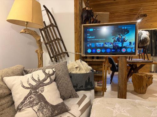Et tv og/eller underholdning på Chalet le Dolomiti