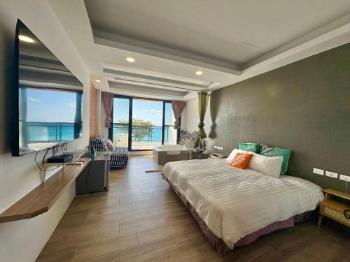 En eller flere senge i et værelse på Rockhand Homestay