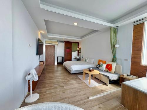 Et opholdsområde på Rockhand Homestay