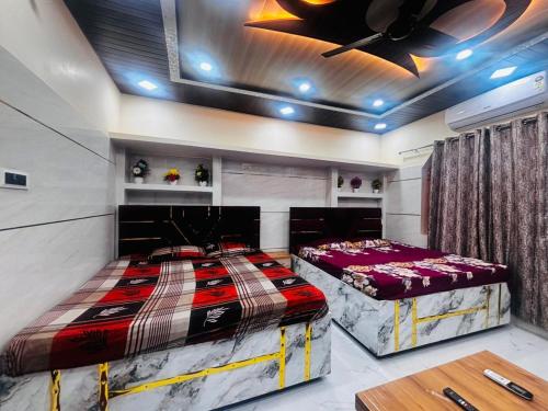 Giường trong phòng chung tại Vb Hotel