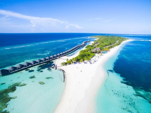 an aerial view of an island in the ocean at Kuredu Island Resort & Spa in Kuredu