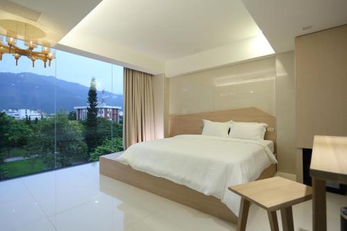 Ένα ή περισσότερα κρεβάτια σε δωμάτιο στο The Fantasy Apartment
