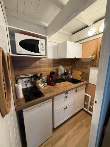 O bucătărie sau chicinetă la Petit cocoon