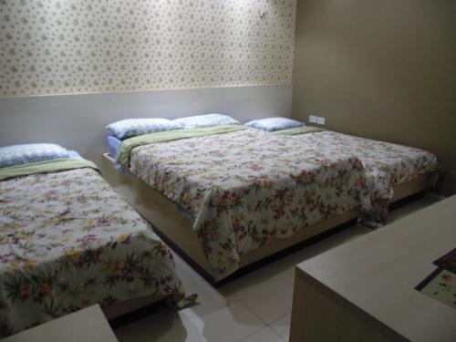 En eller flere senge i et værelse på Juazeiro Residence Hotel