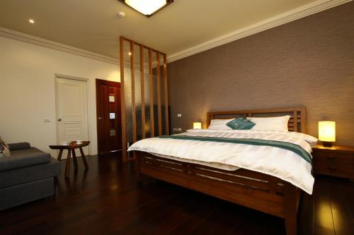 Ένα ή περισσότερα κρεβάτια σε δωμάτιο στο Star Shine B&B