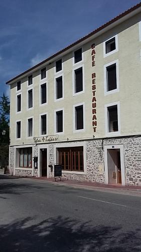 a building on the side of a street at Palais Cathare in Bélesta