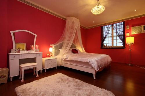 Ένα ή περισσότερα κρεβάτια σε δωμάτιο στο Star Shine B&B