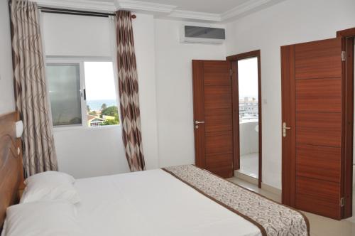 Rosalie's Suitesにあるベッド